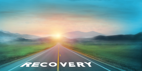 Image of road fading into sunset with word "Recovery"